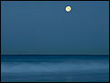 Quiz time! Name this place....-full_moon_over_calm_ocean.jpg